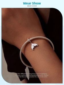 Wrist-worn view of S925 silver fishtail bracelet with inlaid opal and mesh band