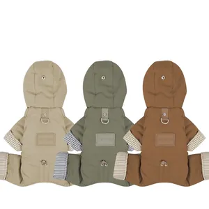 Winter waterproof hooded dog jumpsuit with D-ring harness in beige, green, and brown