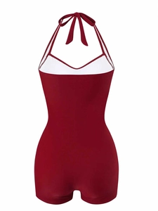 Detailed back view of a dark red halter one-piece swimsuit with boyleg cut and tie straps