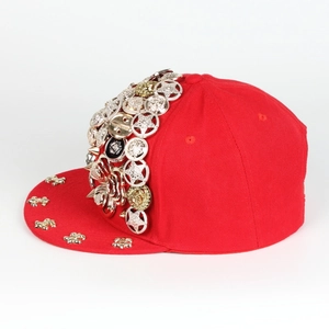 Side view of red hip hop baseball cap featuring metallic studs and punk star rivets