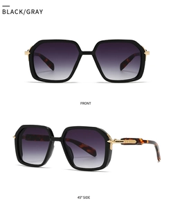 Vue de face et latérale de lunettes de soleil pilote avec accents dorés et verres dégradés