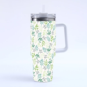 40oz stainless steel tumbler with green leaf pattern, handle and clear straw