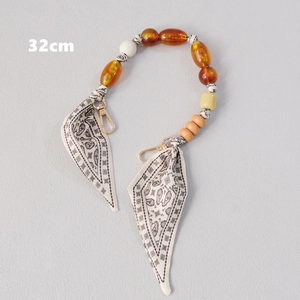 Detail van 32cm kleurrijke kralenketting met zijden sjaal voor handtassen accessoire