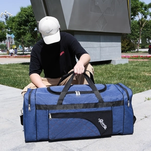Blue large capacity Oxford cloth foldable travel bag with Sports logo and shoulder straps