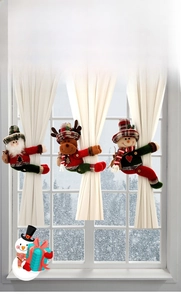 Detailed view of Christmas gnomes curtain tiebacks featuring Santa, elk, and snowman motifs