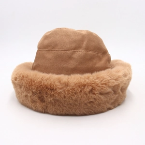 Winter faux fur bucket hat made of warm brown suede material for women in cold weather