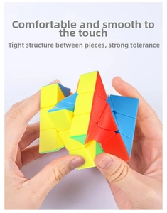 Detailed shot showing hands rotating a smooth 3x3 colorful educational puzzle cube