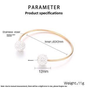 Detail showing gold stainless steel cuff bracelet parameters with crystal pave balls