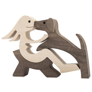Detailed handcrafted wood carving of a human and dog bond decorative ornament