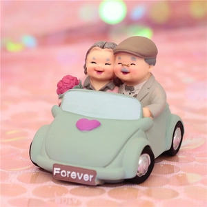 Elderly couple in green car resin figurine with Forever sign for cake topper gift