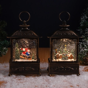 Christmas lantern ornaments with skiing snowman and cottage scenes in bronze finish
