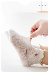 Close-up showing the high elasticity and breathable mesh of cute baby girl cotton socks