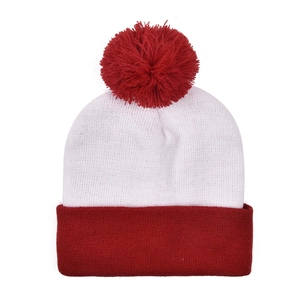 Close-up of knit winter hat featuring a red pom-pom and white body with a folded red brim