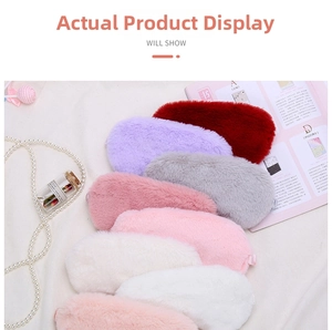 Pile of colorful plush sleep masks with soft texture for light blocking and eye protection