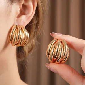 Vintage large gold layered spiral earrings with chunky textured finish for women