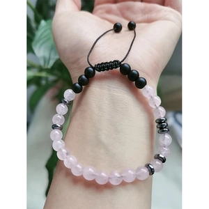 Soul Sister morse code bracelet with matte stone and rose quartz on female wrist