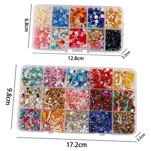 DIY colorful glass beads in plastic storage cases for embroidery and craft projects