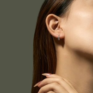 Minimalist S925 sterling silver hoop earrings with clear zircon stones on model