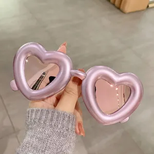 Fashionable heart-shaped polarized sunglasses with lavender frame and pink mirrored lenses