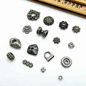 Collection of vintage silver alloy flower spacers and bead caps for DIY jewelry making