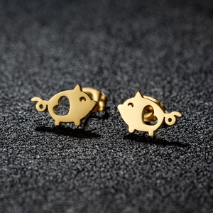 Cute golden stainless steel pig stud earrings with heart-shaped hollow design for women
