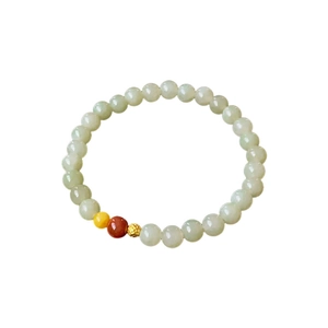 Ethnic Hetian jade beaded bracelet with amber accent and gold-engraved Fu charm
