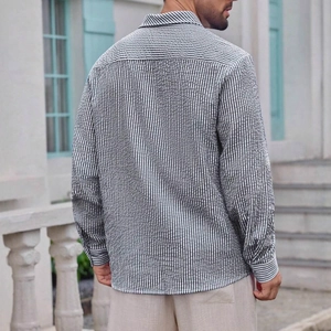 Men's slim fit black and white seersucker striped long sleeve shirt viewed from the back