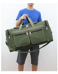 Army green large capacity oxford travel bag showing durable handles and side zipper pockets