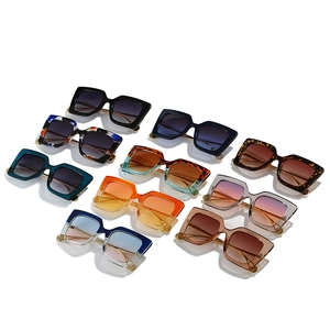 Fashionable oversized square sunglasses for women in various colors with metal temple accents