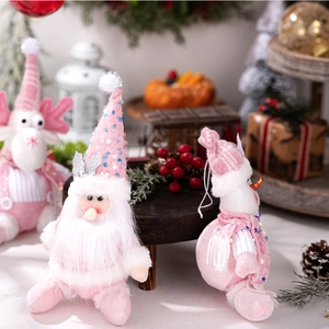 Pink and white Christmas plush trio with sequins including gnome snowman and reindeer