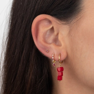 Chic gold hoop earrings set with red cubic zirconia and small stud for modern women