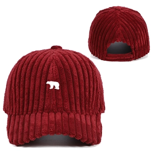 Corduroy baseball cap with polar bear embroidery and adjustable back strap in burgundy