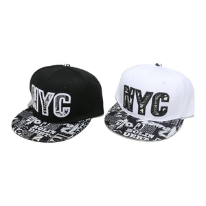 Flat brim NYC snapback hat featuring 3D embroidery and newspaper print bill design