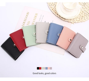 Seven colors of PU leather card holders arranged in a fan shape on a lifestyle background