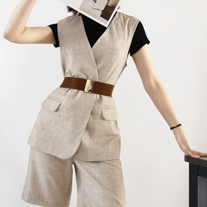 Women's beige sleeveless blazer suit with a 5cm wide brown elastic waist belt