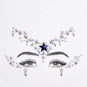 Close-up of iridescent star and teardrop face jewels with blue star center for party