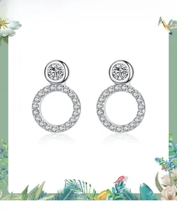 Detailed view of S925 sterling silver round stud earrings with shimmering cubic zirconia