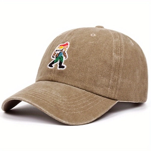 Detail of khaki washed cotton baseball cap featuring colorful character embroidery