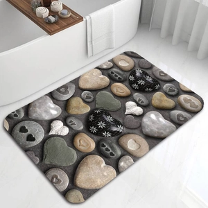 Absorbent diatom mud bathroom mat with 3D pebble pattern and anti-slip backing
