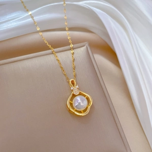 Elegant gold titanium necklace featuring a white pearl pendant with zircon accents