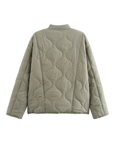 Detailed back view of sage green quilted jacket showing premium stitching and texture