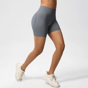 Detail of gray seamless high waist sports shorts with peach butt lifting and knit texture