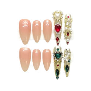 Luxurious handmade press-on nails with royal court style gems and almond shape