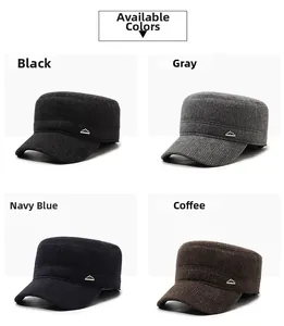 Detail view of winter flat top caps in four colors with thick knitted wool texture
