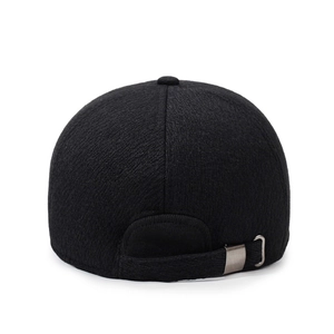 Rear view of black winter baseball cap with thick fabric and adjustable metal buckle