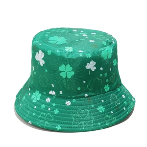 Detail of St. Patrick's Day bucket hat showing clover prints and waterproof green fabric
