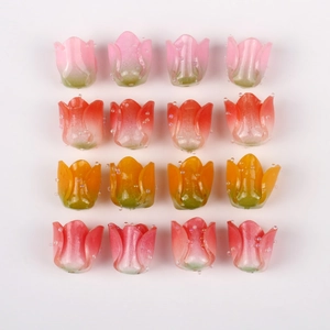 Detailed macro view of 16 gradient acrylic tulip buds for DIY jewelry making accessories