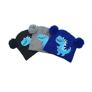 Berretto In Maglia Per Bambini Acrilico Caldo Inverno All'Aperto Cartone Animato Dinosauro Doppio Pom Pom