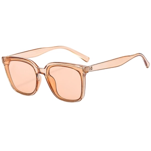 Lunettes de soleil carrées oversize avec monture ambrée et verres orange clair