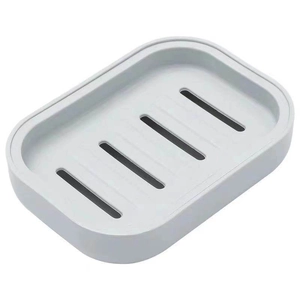 Blue plastic drainage soap dish with parallel hollow slots for bathroom use